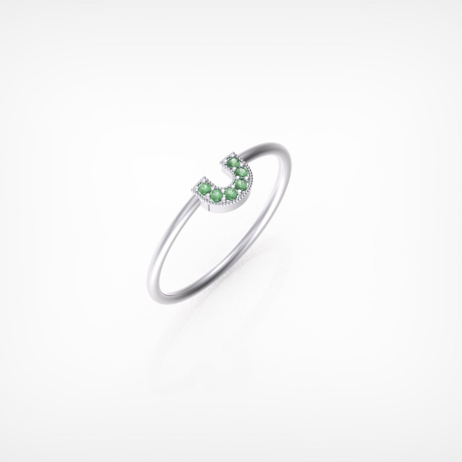 טבעת פרסה עם אבני אמרלד