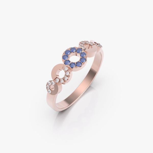 טבעת המעגלים עם ספיר כחול ויהלומים