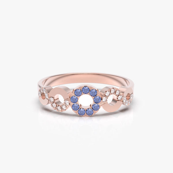 טבעת המעגלים עם ספיר כחול ויהלומים