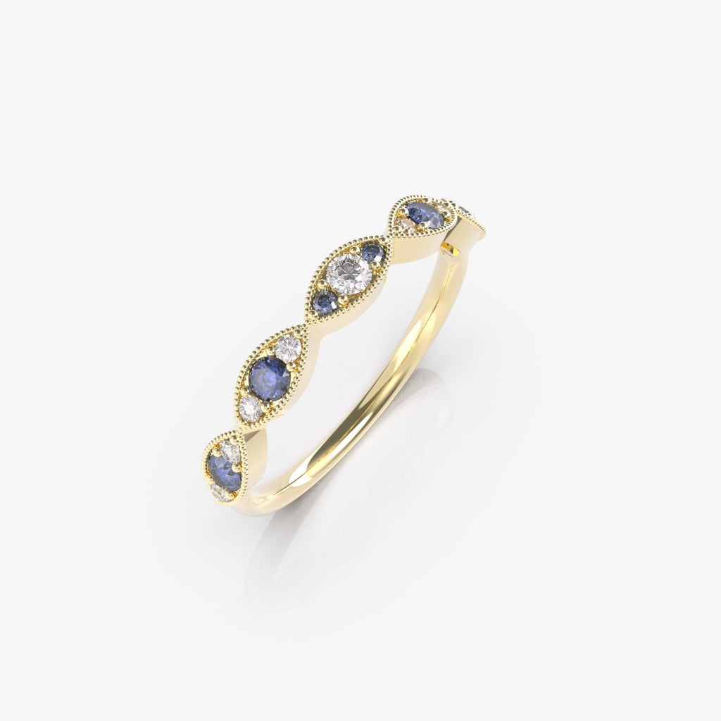 טבעת עיניים עם ספיר כחול ויהלומים