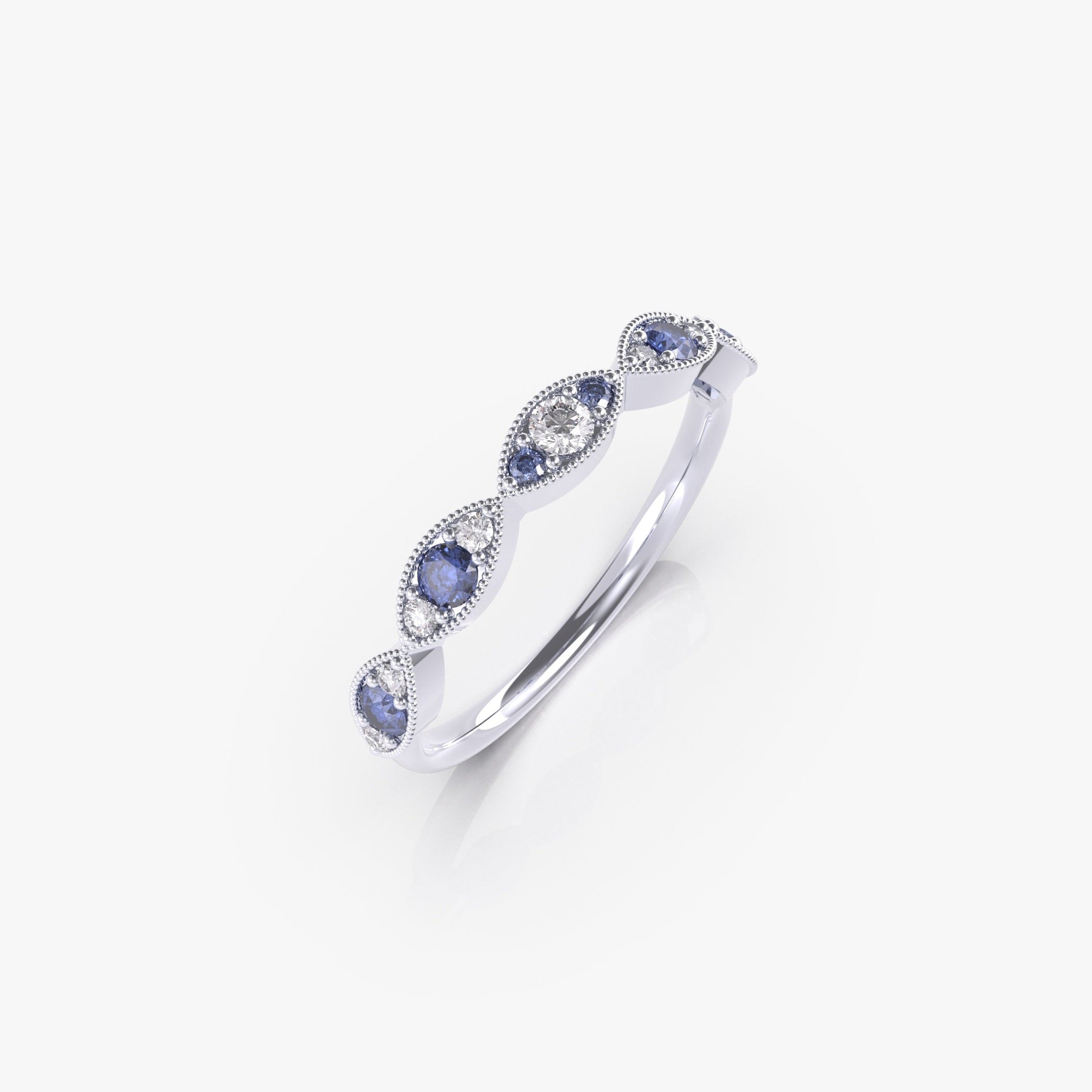 טבעת עיניים עם ספיר כחול ויהלומים