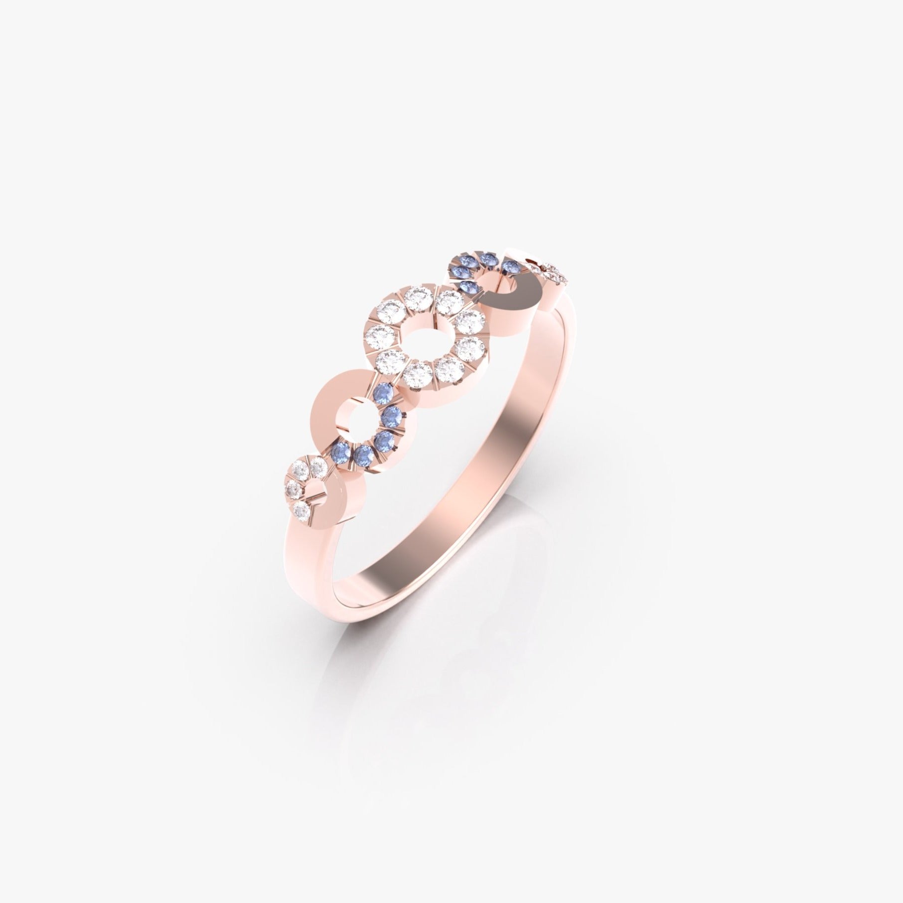 טבעת המעגלים עם ספיר כחול ויהלומים